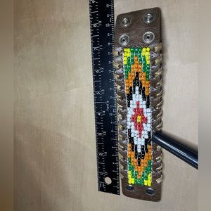 Leather and beaded bracelet.